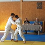 Kyu-Prüfung im Ju-Jutsu: 8 lächelnde Prüflinge
